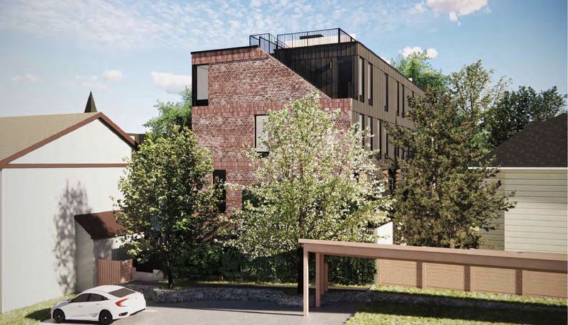 Rendering of the rear of the building with roof deck